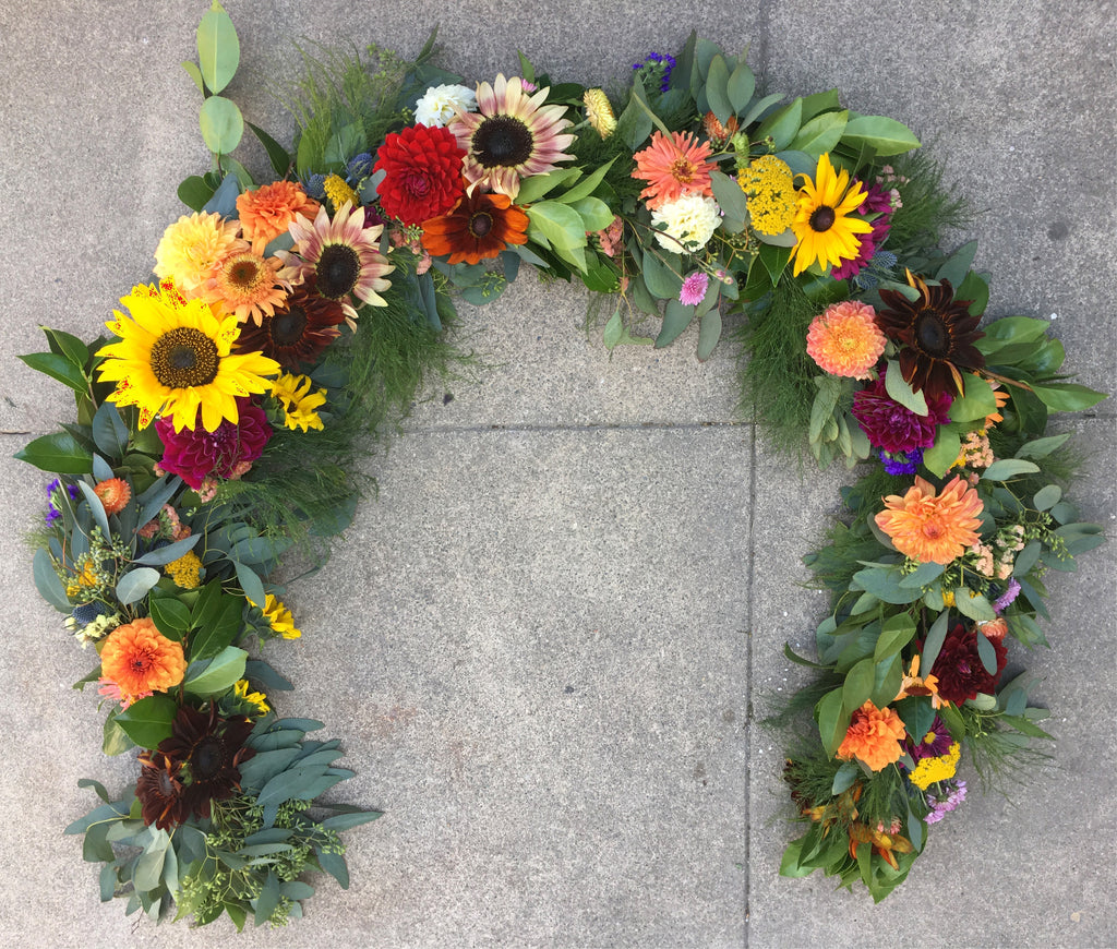 Summer flower garland by Gorgeous and Green for a local wedding with sunflowers! and dahlias
