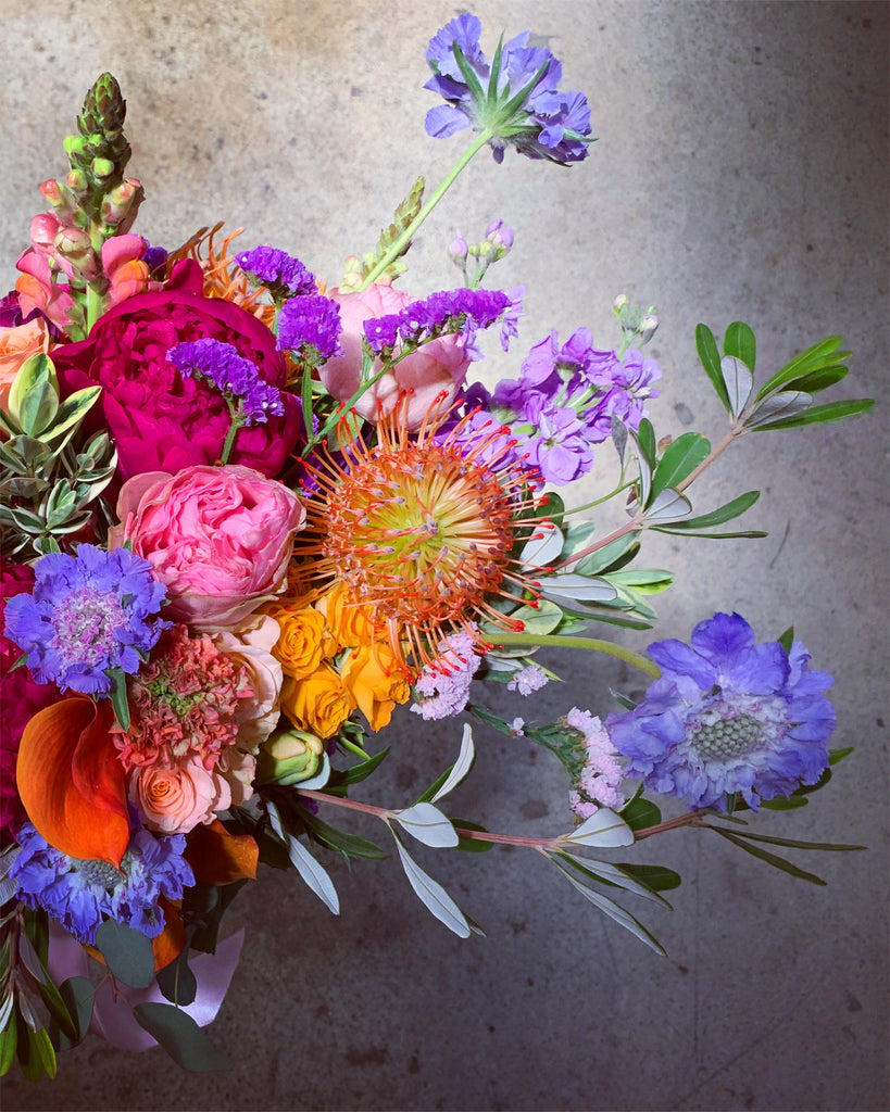fancy peony and pincushion flower arrangement 